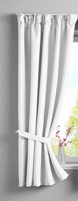 A white curtain tied with a sash is shown hanging next to a window.