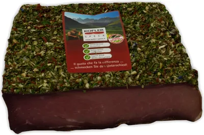 Immagine prodotto di Pancetta affumicata con erbe aromatiche 1/4 vac. ca. 330 gr. - Kofler Delikatessen