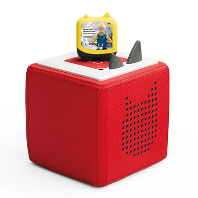 A red cube-shaped audio player with a yellow screen attachment showing a child on a bicycle.