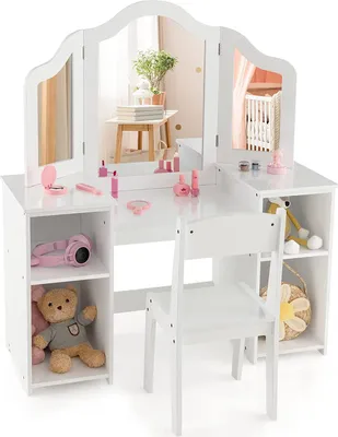 A white children's vanity set with a chair, mirrors, and storage shelves, featuring toy makeup and accessories.