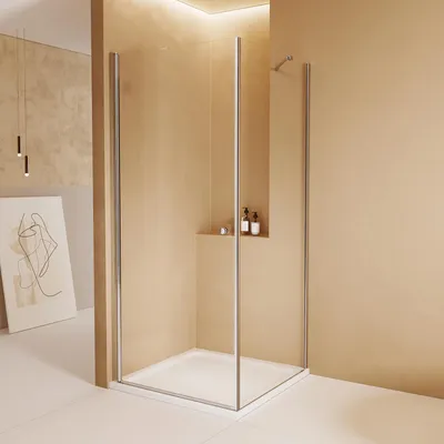 A modern bathroom with a glass shower enclosure.