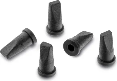 Five black rubber air valve caps are scattered on a white background.