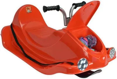 An orange plastic snow sled with handlebars and a storage compartment.
