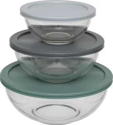 Three glass bowls with lids stacked on top of each other.