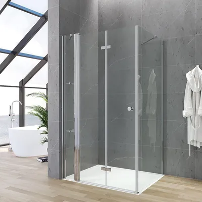 A modern bathroom with a glass shower enclosure, a freestanding bathtub, and a bathrobe hanging on the wall.