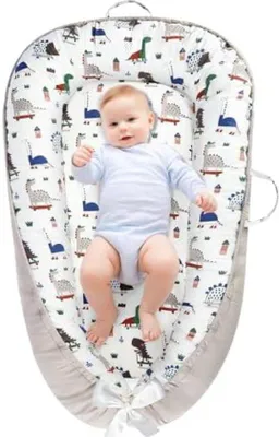 Produktbild von PolkaHome® Babynest für Neugeborene mit grauem Dinosaurier