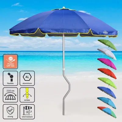 A blue beach umbrella is displayed on a sandy beach with the ocean and sky in the background. Several other colored umbrellas are shown to the right.