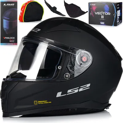 A black LS2 motorcycle helmet with accessories and packaging.