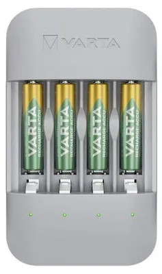A VARTA battery charger with four AA rechargeable batteries inserted.