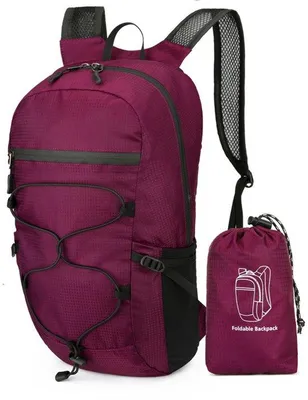 Immagine prodotto di Zaino da trekking pieghevole e impermeabile, con sacchetto di conservazione, da 20 litri, ideale per attività all'aperto e viaggi. Zaino da 20 litri, colore blu.