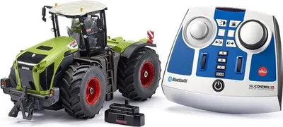A remote-controlled tractor and its controller are displayed on a white background.