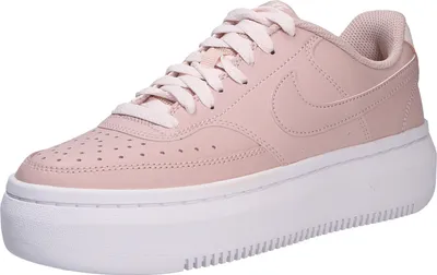 A single pink Nike Court Vision Alta Ltr shoe with a white platform sole is shown against a white background.
