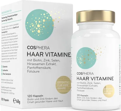 A product shot of a box and bottle of hair vitamins.
