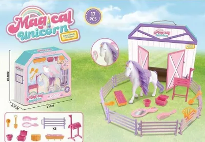 A toy unicorn stable playset with accessories, shown in a staged outdoor setting.