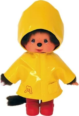 A Monchhichi doll wearing a yellow raincoat and red boots.