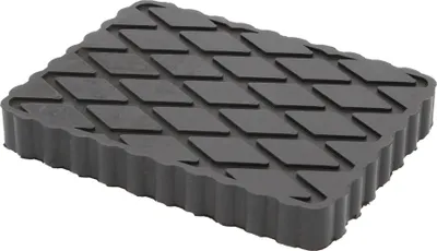 A black rubber pad with a diamond pattern on top and a ribbed edge, shown from a slightly elevated angle on a white background.