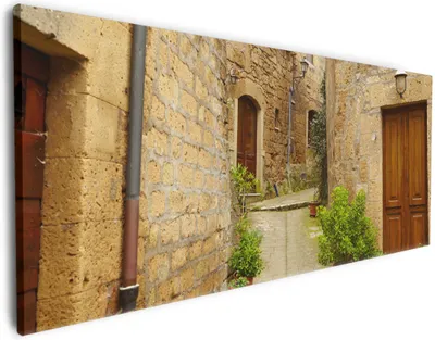 Produktbild von Wallario Premium Leinwandbild Weg durch die Altstadt - Toskana in Italien in Größe 50 x 125 cm
