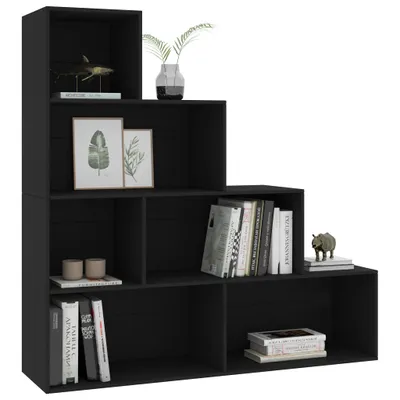 A black modular bookshelf unit with several compartments, displaying books and decorative items.