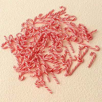Imagen del producto de Piruleta de Navidad mini - Roja - 100 unidades - 3 x 1 cm - Decoración para colgar en el árbol de Navidad