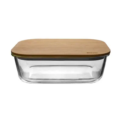 A clear glass food storage container with a wooden lid.