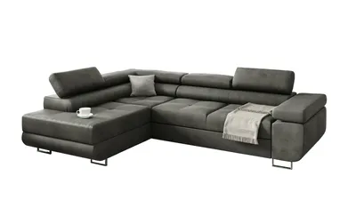 A dark gray sectional sofa is shown against a white background.
