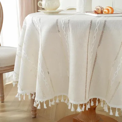 Immagine prodotto di Tovaglia rotonda in macramè con frange, diametro 120 cm, colore avorio, aspetto simile al lino