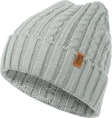 A close-up studio shot of a knitted beanie.