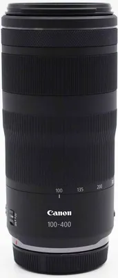 A black Canon RF 100-400mm F5.6-8 IS USM MILC telephoto lens is shown against a white background.