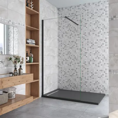 A modern bathroom with a walk-in shower, vanity, and shelving.