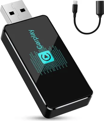 A black CarPlay adapter with a USB connector and a USB-C cable.