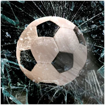 Produktbild von Wallario Premium Glasbild, freischwebende Optik, kräftige Farben, Größe 30 x 30 cm Motiv Fußball - im Fenster, Splitter und Glas