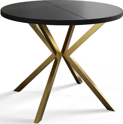 A round black dining table with a gold criss-cross base, shown from a three-quarter angle on a white background.
