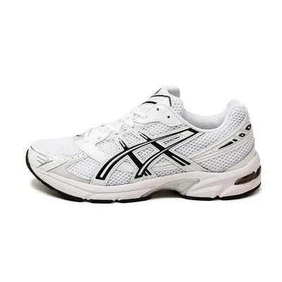 A white and black Asics Gel-1130 running shoe is shown from the side against a white background.