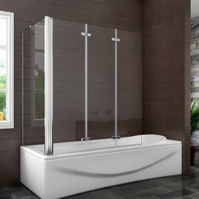 A modern bathroom with a bathtub and a glass shower screen.