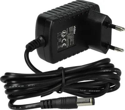 A black power adapter with a coiled black cable and a DC connector.