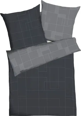 A flat lay of bedding with a geometric pattern.