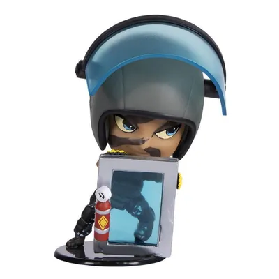 A figurine of a character wearing a helmet and holding a shield.