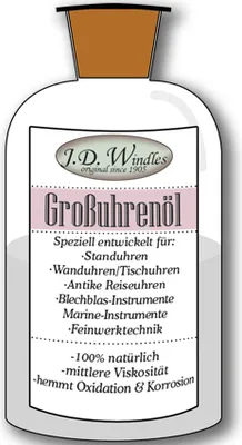 A bottle of clock oil with a label detailing its uses and properties.