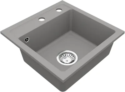 A gray granite kitchen sink with a single basin and a drain.
