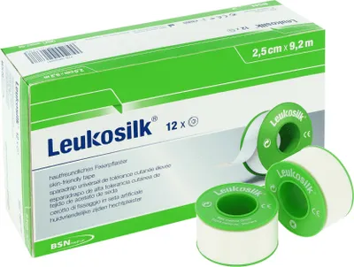 A box of Leukosilk medical tape with three rolls of tape shown in front of it.