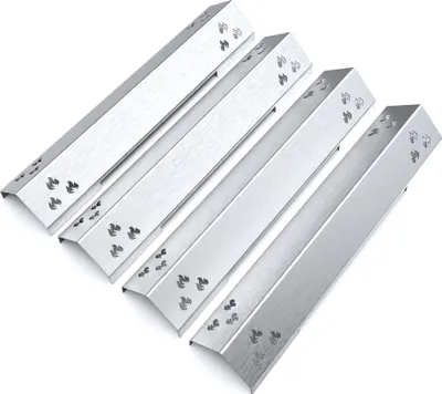 Four metal grill burner covers arranged diagonally on a white background.