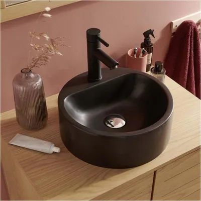 Immagine prodotto di Lavabo da appoggio rotondo in resina Nori