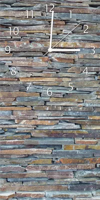 Produktbild von Wallario Design Wanduhr Natursteinmauer in grau braun aus Echtglas, Größe 30 x 60 cm
