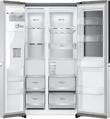 The interior of an open LG refrigerator and freezer combination.