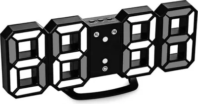 A digital clock with LED display.