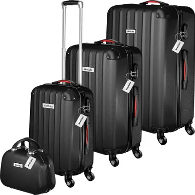 A set of four black suitcases of varying sizes, including a small beauty case, are arranged diagonally on a white background.