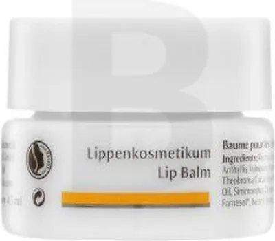 A close-up shot of a white lip balm container with text and logos on it.