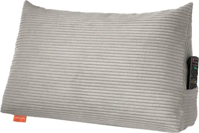 A light gray corduroy backrest pillow with a side pocket containing a remote control.