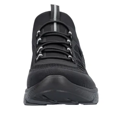 Front view of a black sneaker.