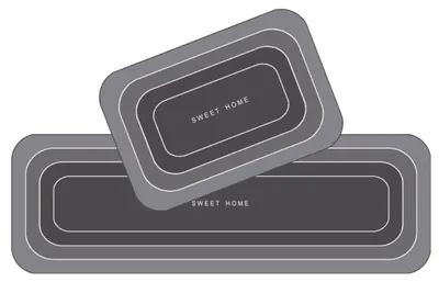 Zwei graue Badematten, eine große rechteckige und eine kleinere, beide mit abgerundeten Ecken und konzentrischen weißen Rändern, mit der Aufschrift 'SWEET HOME'